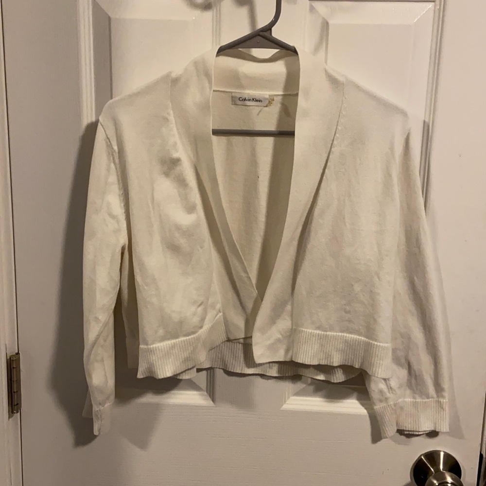 Calvin Klein white cardigan.